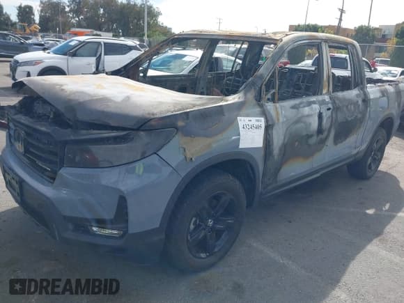 ✅ 2023 Honda Ridgeline Black Edition • VIN: 5FPYK3F88PB051812 • Lot: 43245405. Listed on IAAI with 11 mi. Free auction sales archive from the USA and detailed vehicle history report at DreamBid. Image 6.