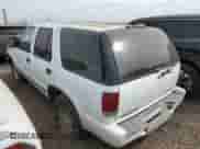 2001 Chevrolet Blazer LS z VIN 1GNCS13W91K247026, wystawiony jako Copart lot #64701453 z przebiegiem 250 681 mil mil oraz Czysty tytuł • Clean title. Historia ofert i sprzedaży dostępna na DreamBid. Obrazek 2.