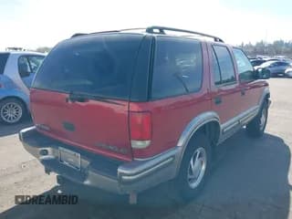 ✅ 1999 Chevrolet Blazer LS • VIN: 1GNDT13W8X2178923 • Lot: 41877375. Wystawiony na IAAI z przebiegiem 180 146 mil. Bezpłatny archiwum sprzedaży aukcyjnych z USA i szczegółowy raport historii pojazdu na DreamBid. Zdjęcie 4.