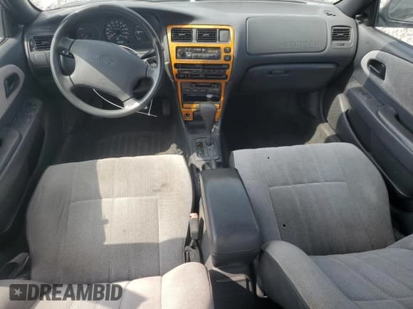 ✅ 1997 Toyota Corolla • VIN: 1NXBA02E3VZ628113 • Lot: 80172205. Wystawiony na Copart z przebiegiem 104 442 mil. Bezpłatny archiwum sprzedaży aukcyjnych z USA i szczegółowy raport historii pojazdu na DreamBid. Zdjęcie 8.