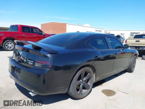 2009 Dodge Charger SRT-8 с VIN 2B3LA73W29H568764, выставлен на аукционе IAAI как лот 41869358 с пробегом 96 029 миль миль и . История ставок и продаж доступна на DreamBid. Изображение 4.