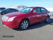 ✅ 2010 Mercury Milan Premier • VIN: 3MEHM0JG5AR610656 • Lot: 43577169. Listed on IAAI with 99,081 mi. Free auction sales archive from the USA and detailed vehicle history report at DreamBid. Image 2.