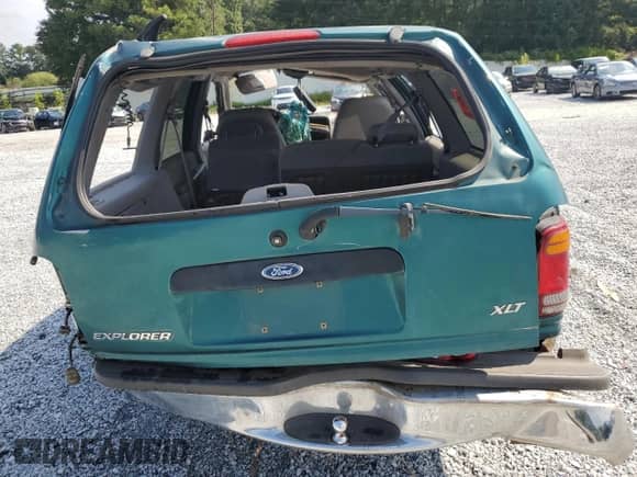 1998 Ford Explorer XLT z VIN 1FMZU32P8WZA15594, wystawiony jako Copart lot #69445705 z przebiegiem Nie podano mil oraz Szkoda całkowita • Salvage title. Historia ofert i sprzedaży dostępna na DreamBid. Obrazek 6.