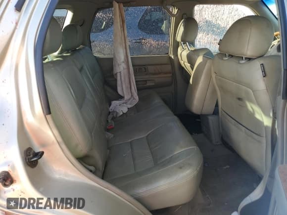 ✅ 2001 Infiniti QX4 Luxury • VIN: JNRDR09YX1W213505 • Лот: 71317834. Опубликован ранее на Copart с пробегом Не указан. Бесплатный доступ к архиву аукционных продаж из США и подробный отчёт об истории автомобиля на DreamBid. Изображение 11.