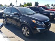 ✅ 2014 Kia Sportage EX • VIN: KNDPCCAC4E7599869 • Lot: 69689325. Listed on Copart with 89,430 mi. Free auction sales archive from the USA and detailed vehicle history report at DreamBid. Image 4.