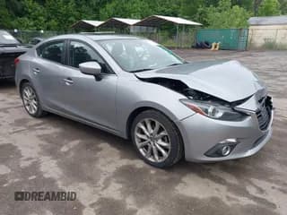 ✅ 2014 Mazda 3 S Grand Touring • VIN: JM1BM1W36E1206915 • Lot: 42315062. Listed on IAAI with 157,945 mi. Free auction sales archive from the USA and detailed vehicle history report at DreamBid. Image 1.