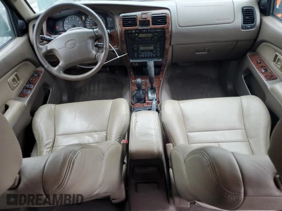 ✅ 1999 Toyota 4Runner Limited • VIN: JT3HN87R1X0200665 • Lot: 90686625. Listed on Copart with 198,982 mi. Free auction sales archive from the USA and detailed vehicle history report at DreamBid. Image 8.