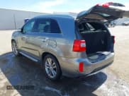 ✅ 2015 Kia Sorento SX • VIN: 5XYKWDA74FG591902 • Lot: 41856991. Listed on IAAI with 128,471 mi. Free auction sales archive from the USA and detailed vehicle history report at DreamBid. Image 3.