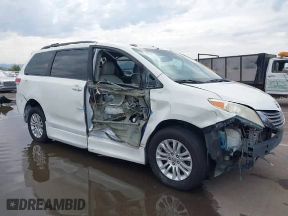 2011 Toyota Sienna XLE AAS with VIN 5TDYK3DC1BS106301, listed as a IAAI auction lot 43423294 with 158,803 mi miles and . Bid and sale history available at DreamBid. Image 6.