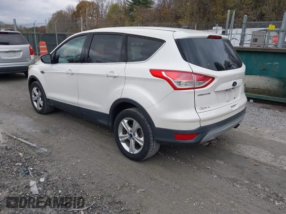 ✅ 2015 Ford Escape SE • VIN: 1FMCU9GX5FUB16820 • Lot: 43584827. Listed on IAAI with 131,101 mi. Free auction sales archive from the USA and detailed vehicle history report at DreamBid. Image 3.