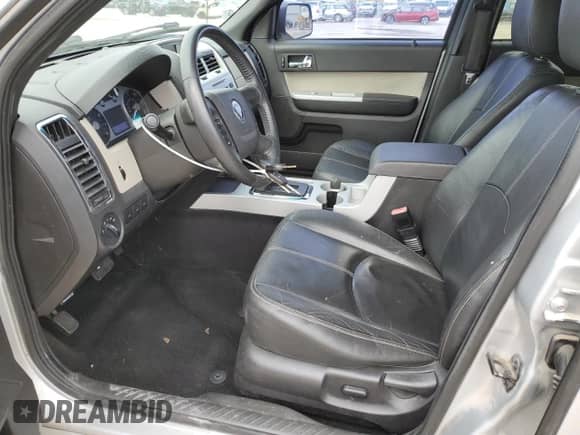 2011 Mercury Mariner z VIN 4M2CN8B73BKJ06886, wystawiony jako Copart lot #50308485 z przebiegiem 118 584 mil mil oraz Szkoda całkowita • Salvage title. Historia ofert i sprzedaży dostępna na DreamBid. Obrazek 7.