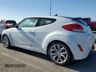✅ 2013 Hyundai Veloster RE:MIX • VIN: KMHTC6AD7DU162114 • Lot: 74152784. Wystawiony na Copart z przebiegiem 103 574 mil. Bezpłatny archiwum sprzedaży aukcyjnych z USA i szczegółowy raport historii pojazdu na DreamBid. Zdjęcie 2.