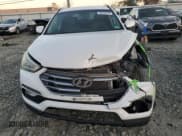 ✅ 2017 Hyundai Santa Fe 2.4L • VIN: 5NMZUDLB9HH016404 • Lot: 86643515. Listed on Copart with 73,795 mi. Free auction sales archive from the USA and detailed vehicle history report at DreamBid. Image 5.