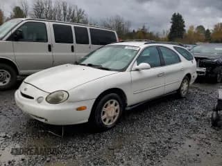 ✅ 1997 Ford Taurus GL • VIN: 1FALP57U2VG108106 • Lot: 79319234. Listed on Copart with 127,098 mi. Free auction sales archive from the USA and detailed vehicle history report at DreamBid. Image 1.