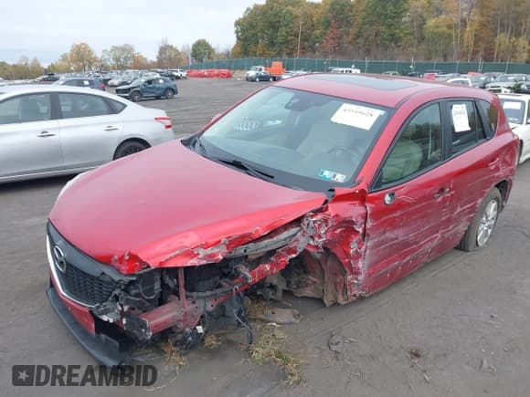 ✅ 2014 Mazda CX-5 Touring • VIN: JM3KE4CY8E0343530 • Lot: 43549628. Listed on IAAI with 133,032 mi. Free auction sales archive from the USA and detailed vehicle history report at DreamBid. Image 2.