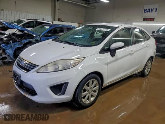 ✅ 2011 Ford Fiesta SE • VIN: 3FADP4BJ3BM166920 • Lot: 94277325. Listed on Copart with 207,358 mi. Free auction sales archive from the USA and detailed vehicle history report at DreamBid. Image 1.