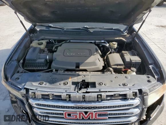 ✅ 2015 GMC Canyon 2WD SLE • VIN: 1GTH5BE3XF1243238 • Лот: 62090035. Опубликован ранее на Copart с пробегом 79 477 миль. Бесплатный доступ к архиву аукционных продаж из США и подробный отчёт об истории автомобиля на DreamBid. Изображение 11.