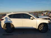 ✅ 2018 Mazda CX-5 Touring • VIN: JM3KFACM0J1473458 • Lot: 43595475. Wystawiony na IAAI z przebiegiem 88 304 mil. Bezpłatny archiwum sprzedaży aukcyjnych z USA i szczegółowy raport historii pojazdu na DreamBid. Zdjęcie 13.
