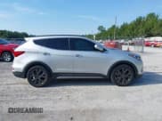 ✅ 2017 Hyundai Santa Fe Ultimate • VIN: 5XYZW4LA7HG407577 • Lot: 42429017. Listed on IAAI with 149,674 mi. Free auction sales archive from the USA and detailed vehicle history report at DreamBid. Image 13.