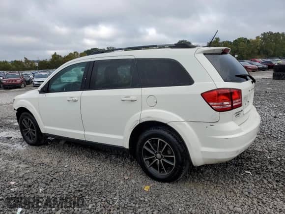 2017 Dodge Journey SE with VIN 3C4PDCAB8HT622011, listed as a Copart auction lot 85518895 with 121,368 mi miles and Salvage title. Bid and sale history available at DreamBid. Image 2.