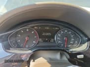 ✅ 2015 Audi A8 4.0T • VIN: WAU32AFD8FN037989 • Лот: 71414795. Опубликован ранее на Copart с пробегом 98 189 миль. Бесплатный доступ к архиву аукционных продаж из США и подробный отчёт об истории автомобиля на DreamBid. Изображение 9.