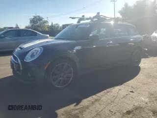 ✅ 2018 MINI Clubman Cooper S • VIN: WMWLN9C51J2E50594 • Lot: 87117155. Listed on Copart with 100,123 mi. Free auction sales archive from the USA and detailed vehicle history report at DreamBid. Image 1.