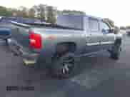 2010 Chevrolet Silverado 1500 LT z VIN 3GCRKSE39AG214336, wystawiony jako IAAI lot #43565275 z przebiegiem 246 168 mil mil oraz . Historia ofert i sprzedaży dostępna na DreamBid. Obrazek 4.