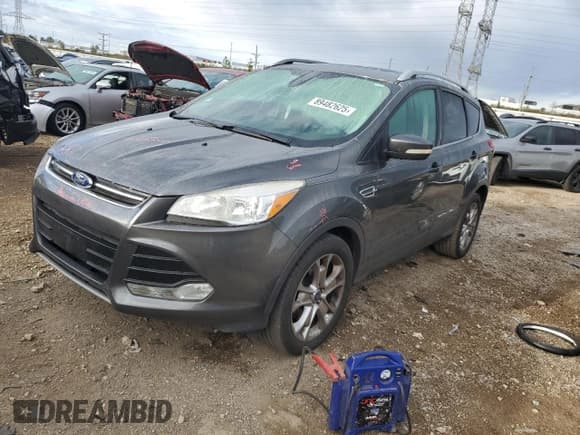 ✅ 2015 Ford Escape Titanium • VIN: 1FMCU9J98FUB16983 • Lot: 89482625. Listed on Copart with 142,998 mi. Free auction sales archive from the USA and detailed vehicle history report at DreamBid. Image 1.