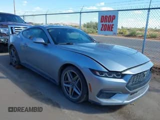 ✅ 2024 Ford Mustang EcoBoost Premium • VIN: 1FA6P8TH6R5141604 • Lot: 43256598. Listed on IAAI with 25,216 mi. Free auction sales archive from the USA and detailed vehicle history report at DreamBid. Image 1.