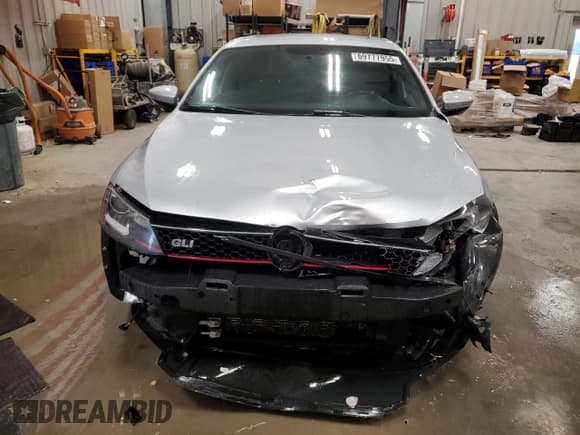 ✅ 2014 Volkswagen Jetta GLI • VIN: 3VW5T7AJ1EM302461 • Lot: 69777955. Listed on Copart with 123,303 mi. Free auction sales archive from the USA and detailed vehicle history report at DreamBid. Image 5.