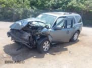 ✅ 2010 Mercury Mariner • VIN: 4M2CN9BG3AKJ28830 • Lot: 42328802. Listed on IAAI with 116,650 mi. Free auction sales archive from the USA and detailed vehicle history report at DreamBid. Image 2.