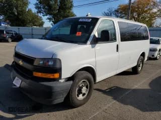 ✅ 2019 Chevrolet Express Passenger LS • VIN: 1GAWGEFG6K1321313 • Lot: 91216705. Listed on Copart with 104,134 mi. Free auction sales archive from the USA and detailed vehicle history report at DreamBid. Image 1.