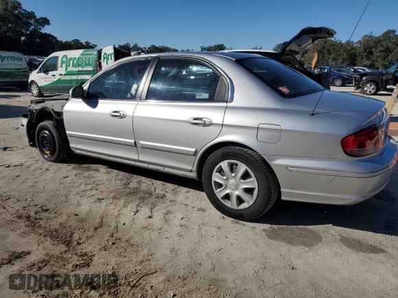 2003 Hyundai Sonata с VIN KMHWF25S33A905177, выставлен на аукционе Copart как лот 87513005 с пробегом 82 416 миль миль и Списание • Salvage title. История ставок и продаж доступна на DreamBid. Изображение 2.