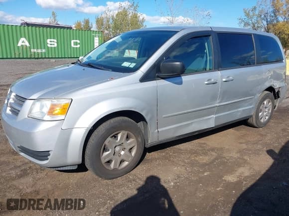 ✅ 2010 Dodge Grand Caravan SE • VIN: 2D4RN4DE5AR318969 • Lot: 43513600. Listed on IAAI with 164,143 mi. Free auction sales archive from the USA and detailed vehicle history report at DreamBid. Image 2.