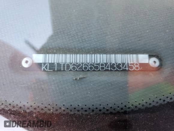 2005 Chevrolet Aveo LS с VIN KL1TD62665B433458, выставлен на аукционе Copart как лот 89824775 с пробегом 187 854 миль миль и Списание • Salvage title. История ставок и продаж доступна на DreamBid. Изображение 12.