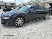 ✅ 2015 Audi A8 • VIN: WAUJGAFD9FN007845 • Lot: 67994865. Wystawiony na Copart z przebiegiem 121 220 mil. Bezpłatny archiwum sprzedaży aukcyjnych z USA i szczegółowy raport historii pojazdu na DreamBid. Zdjęcie 1.