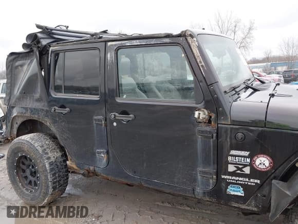 ✅ 2008 Jeep Wrangler Unlimited X • VIN: 1J4GA39138L641138 • Lot: 41986230. Listed on IAAI with 215,026 mi. Free auction sales archive from the USA and detailed vehicle history report at DreamBid. Image 14.