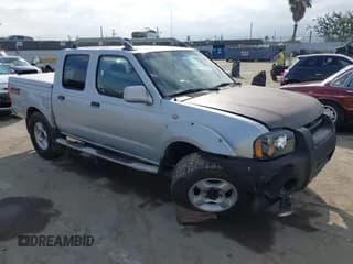 ✅ 2001 Nissan Frontier SE • VIN: 1N6ED27Y81C317264 • Lot: 43592298. Listed on IAAI with 273,382 mi. Free auction sales archive from the USA and detailed vehicle history report at DreamBid. Image 1.