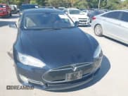 ✅ 2013 Tesla Model S • VIN: 5YJSA1CN2DFP20457 • Lot: 43461051. Listed on IAAI with 338,292 mi. Free auction sales archive from the USA and detailed vehicle history report at DreamBid. Image 12.