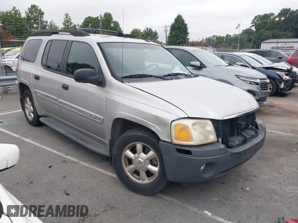 ✅ 2004 GMC Envoy SLE • VIN: 1GKES16S746136499 • Lot: 43016716. Listed on IAAI with 306,631 mi. Free auction sales archive from the USA and detailed vehicle history report at DreamBid. Image 1.