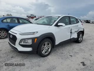 ✅ 2019 Hyundai Kona SE • VIN: KM8K12AA8KU325883 • Лот: 68517345. Опубликован ранее на Copart с пробегом 63 646 миль. Бесплатный доступ к архиву аукционных продаж из США и подробный отчёт об истории автомобиля на DreamBid. Изображение 1.