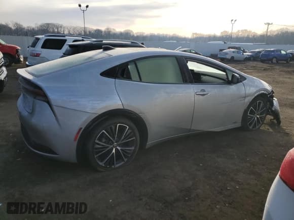 ✅ 2023 Toyota Prius LE • VIN: JTDADABU1P3000905 • Lot: 42090544. Listed on Copart with Not provided. Free auction sales archive from the USA and detailed vehicle history report at DreamBid. Image 3.