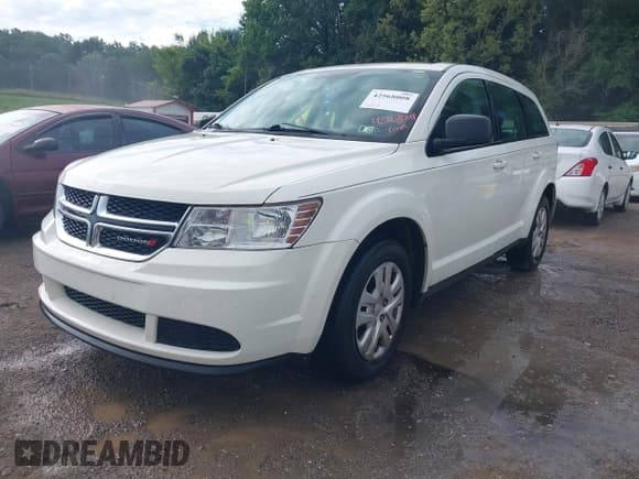 ✅ 2014 Dodge Journey American Value • VIN: 3C4PDCAB2ET247194 • Lot: 42968008. Listed on IAAI with 142,469 mi. Free auction sales archive from the USA and detailed vehicle history report at DreamBid. Image 2.