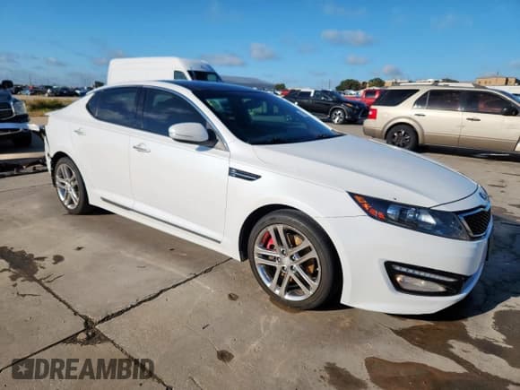 ✅ 2013 Kia Optima SX • VIN: 5XXGR4A65DG234220 • Lot: 81566445. Listed on Copart with 192,605 mi. Free auction sales archive from the USA and detailed vehicle history report at DreamBid. Image 4.