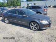 ✅ 2012 Volkswagen CC Lux Plus • VIN: WVWHP7AN8CE548031 • Lot: 59805585. Listed on Copart with 96,699 mi. Free auction sales archive from the USA and detailed vehicle history report at DreamBid. Image 4.