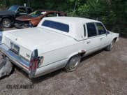 ✅ 1991 Cadillac Brougham • VIN: 1G6DW54E5MR723477 • Лот: 42535123. Опубликован ранее на IAAI с пробегом 300 768 миль. Бесплатный доступ к архиву аукционных продаж из США и подробный отчёт об истории автомобиля на DreamBid. Изображение 4.