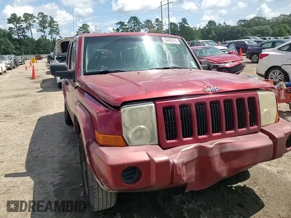 ✅ 2006 Jeep Commander • VIN: 1J8HH48KX6C203308 • Lot: 64456765. Listed on Copart with 185,794 mi. Free auction sales archive from the USA and detailed vehicle history report at DreamBid. Image 14.