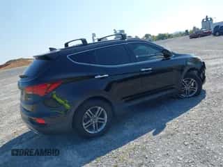 2017 Hyundai Santa Fe 2.4L z VIN 5XYZU3LB1HG479304, wystawiony jako IAAI lot #43212774 z przebiegiem 136 426 mil mil oraz . Historia ofert i sprzedaży dostępna na DreamBid. Obrazek 4.