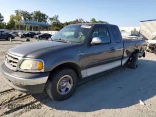✅ 2002 Ford F-150 XL • VIN: 1FTRX17202NB56576 • Lot: 80185385. Wystawiony na Copart z przebiegiem 217 585 mil. Bezpłatny archiwum sprzedaży aukcyjnych z USA i szczegółowy raport historii pojazdu na DreamBid. Zdjęcie 1.