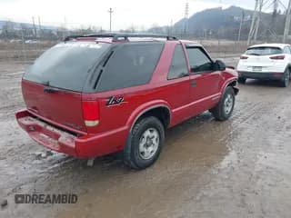 ✅ 2003 Chevrolet Blazer LS • VIN: 1GNCT18X93K171504 • Lot: 41682798. Wystawiony na IAAI z przebiegiem 74 017 mil. Bezpłatny archiwum sprzedaży aukcyjnych z USA i szczegółowy raport historii pojazdu na DreamBid. Zdjęcie 4.